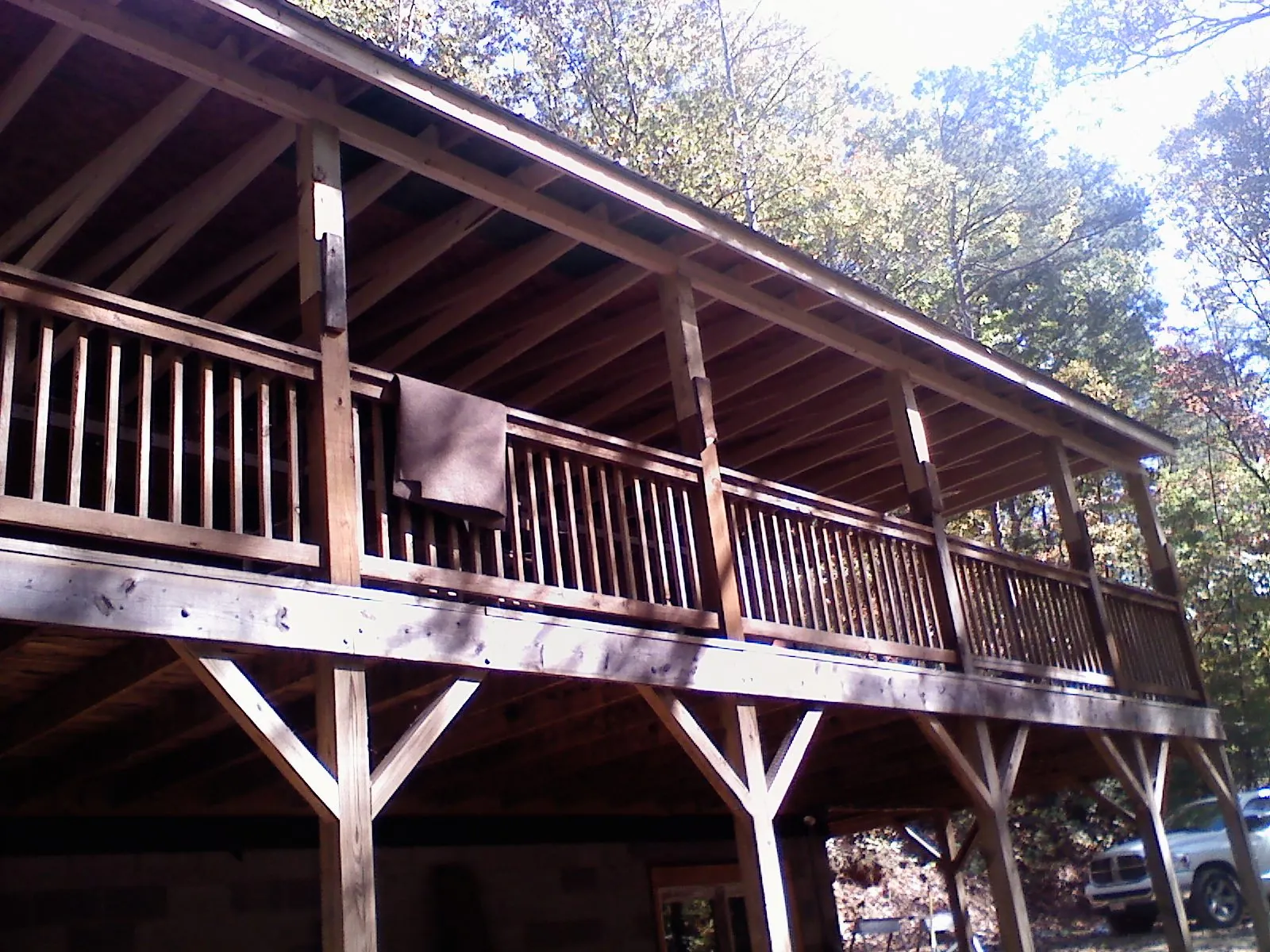 Timber framing under a new elevated porch and deck — Roof Leak Repair in Basco by Roofing Brothers